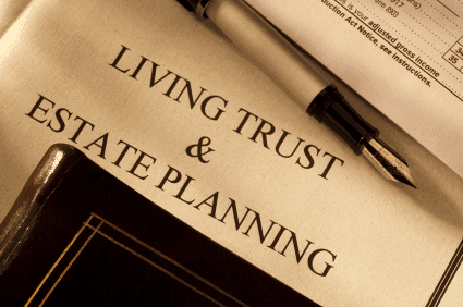 Document titled 'Living Trust & Estate Planning' with a pen on top.